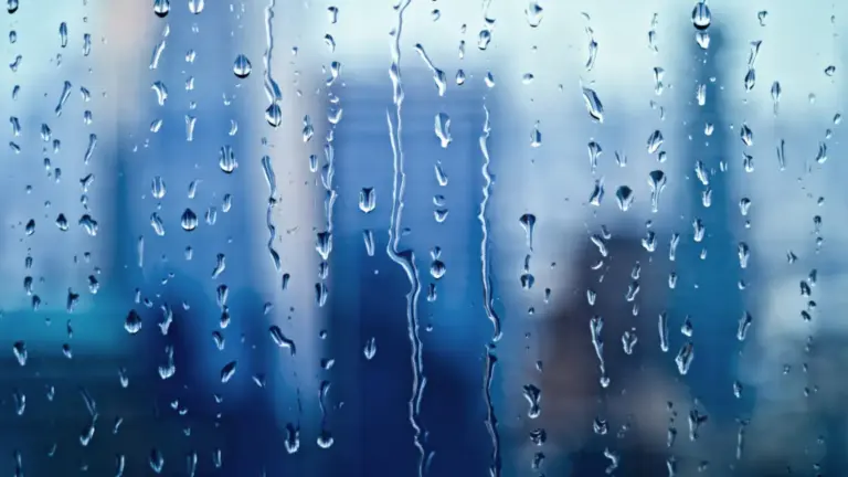 The Invisible Micro-Lightning: How Raindrops Act as Miniaturized Electrical Discharges to Corrode Protected Surfaces